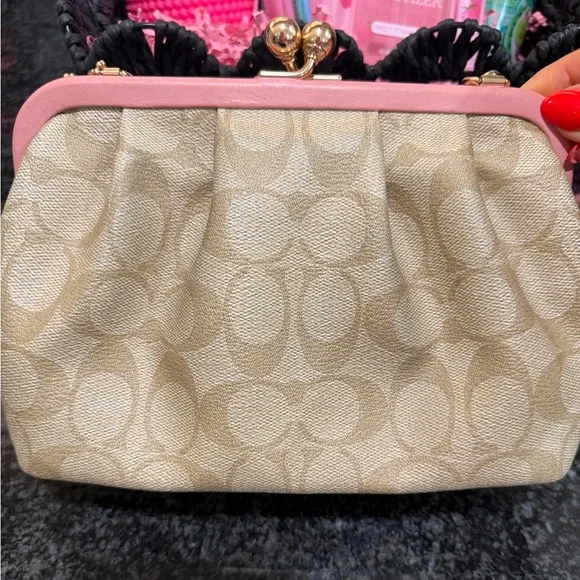 Signature Canvas Tan/Pink Colored Coach Bag. - Picture 1 of 4